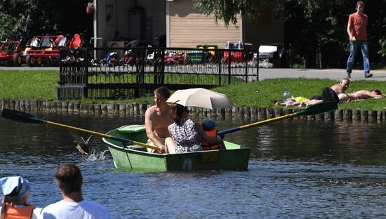 People relax at Moscow's Vorontsovsky Park