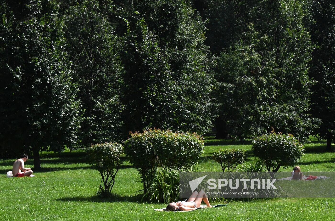 People relax at Moscow's Vorontsovsky Park