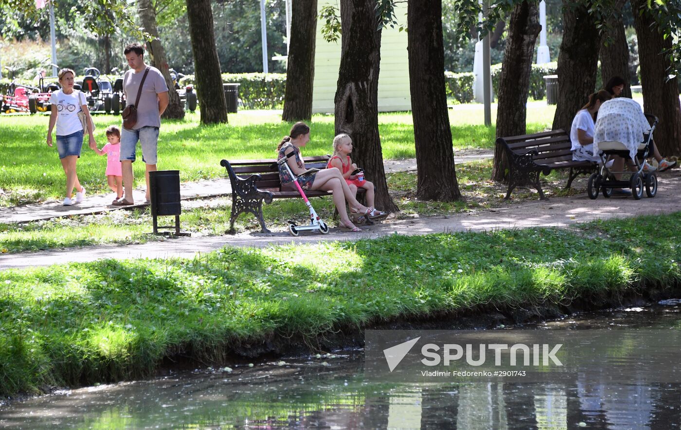People relax at Moscow's Vorontsovsky Park