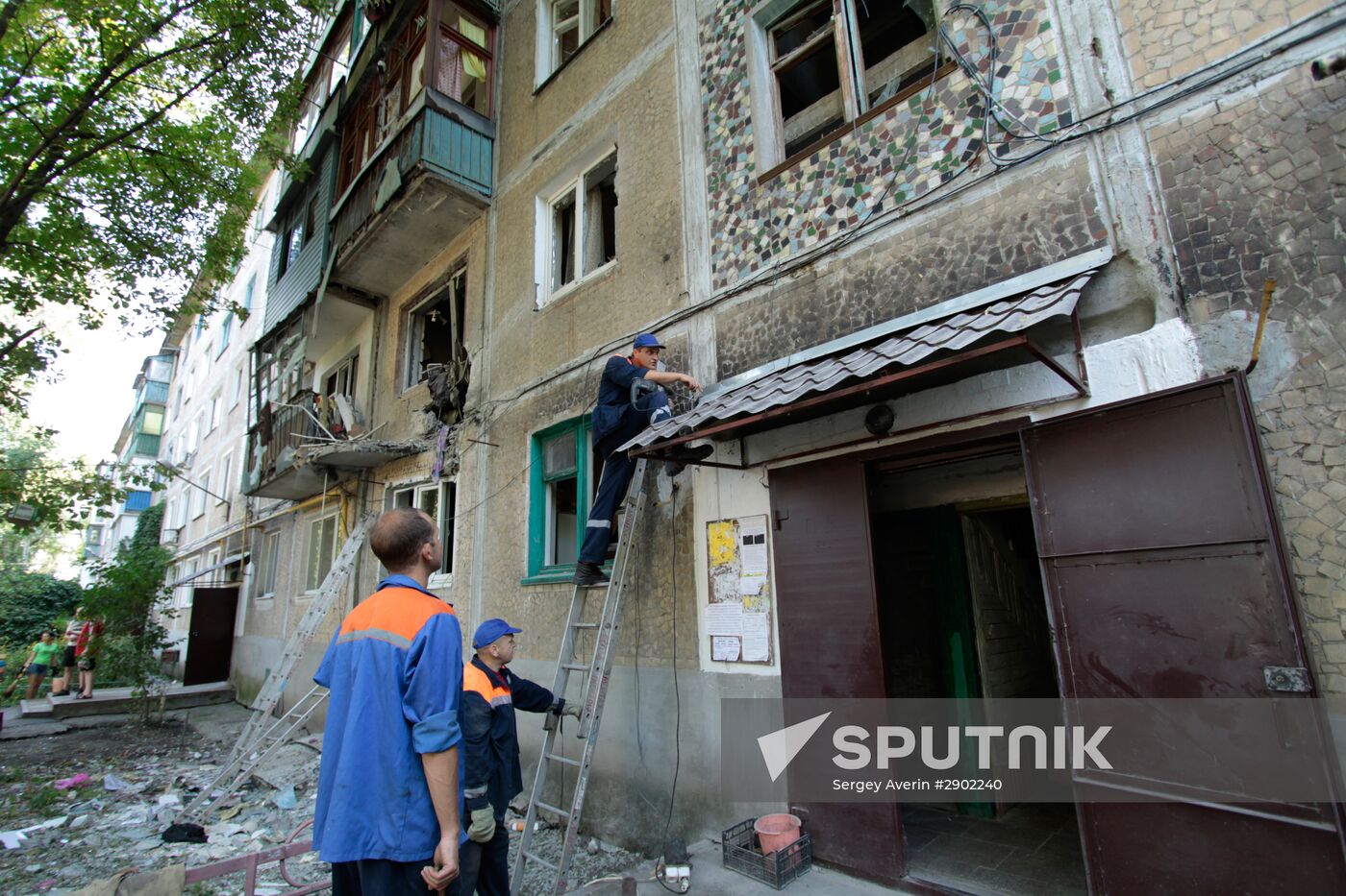 Aftermath of shelling in Yasinovataya, Donbass
