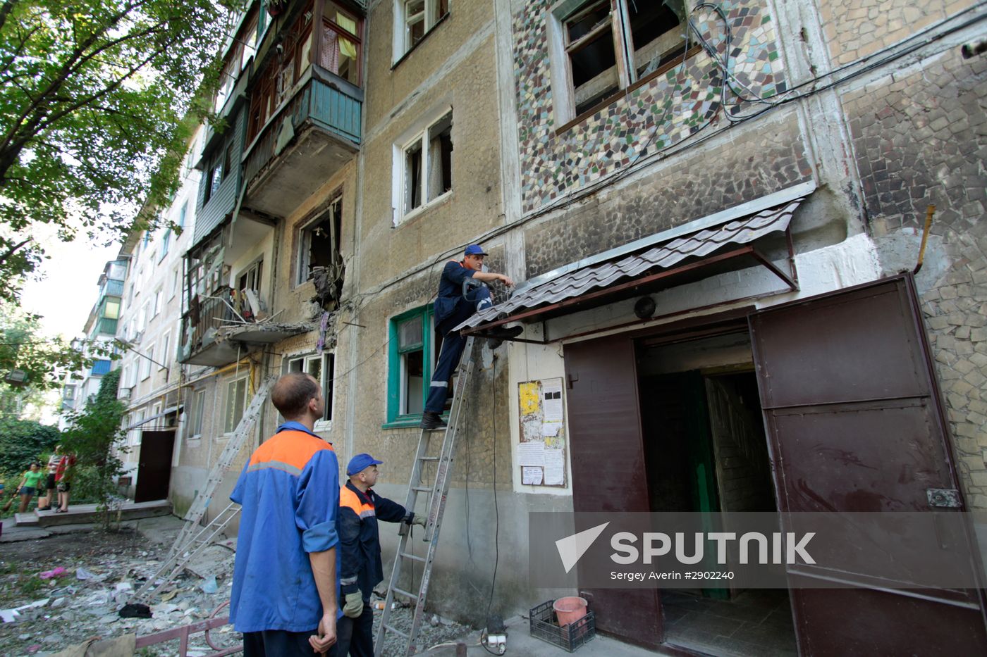 Aftermath of shelling in Yasinovataya, Donbass