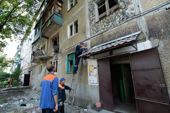 Aftermath of shelling in Yasinovataya, Donbass