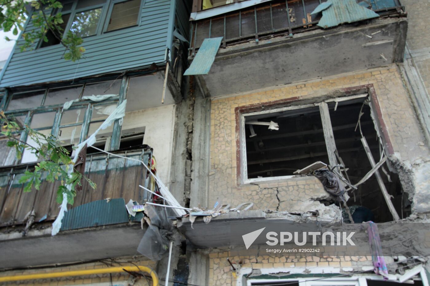 Aftermath of shelling in Yasinovataya, Donbass