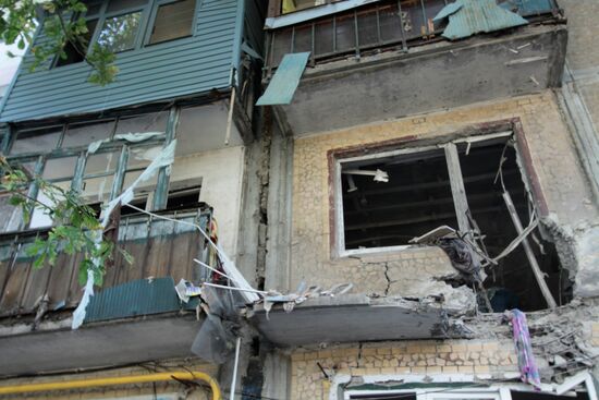 Aftermath of shelling in Yasinovataya, Donbass