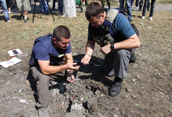 Aftermath of shelling in Yasinovataya, Donbass