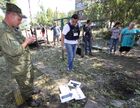 Aftermath of shelling in Yasinovataya, Donbass