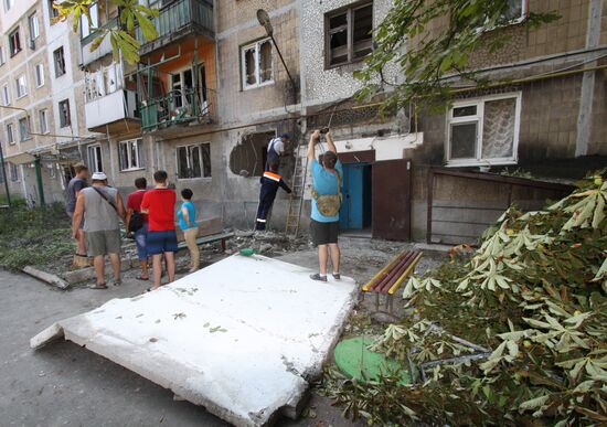 Aftermath of shelling in Yasinovataya, Donbass