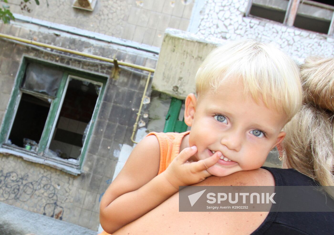 Aftermath of shelling in Yasinovataya, Donbass