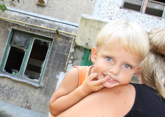 Aftermath of shelling in Yasinovataya, Donbass