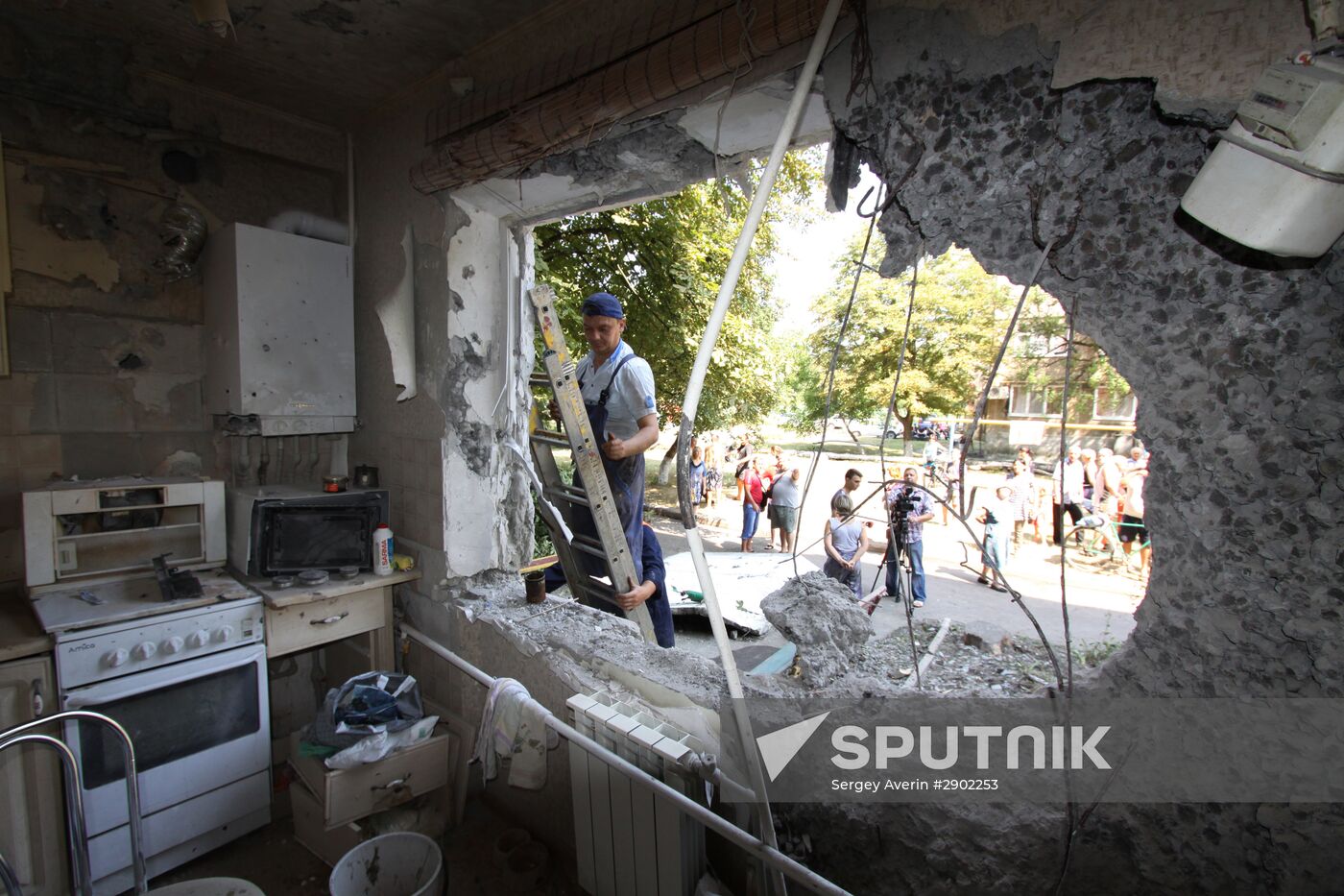 Aftermath of shelling in Yasinovataya, Donbass