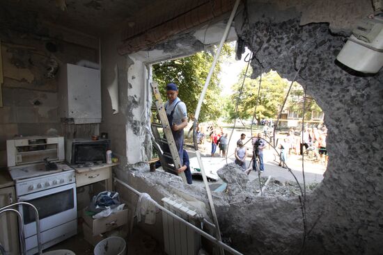 Aftermath of shelling in Yasinovataya, Donbass