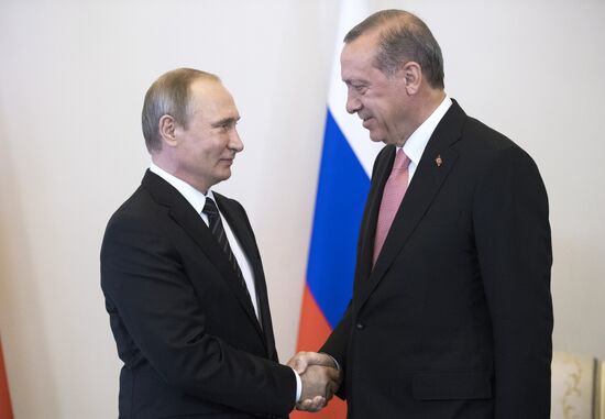 Russian President Vladimir Putin meets with Turkish President Recep Tayyip Erdogan in St. Petersburg