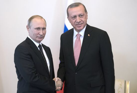 Russian President Vladimir Putin meets with Turkish President Recep Tayyip Erdogan in St. Petersburg