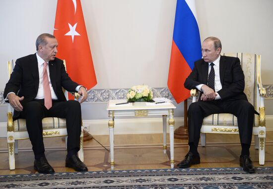 Russian President Vladimir Putin meets with Turkish President Recep Tayyip Erdogan in St. Petersburg