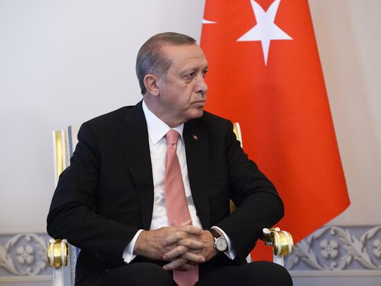 Russian President Vladimir Putin meets with Turkish President Recep Tayyip Erdogan in St. Petersburg