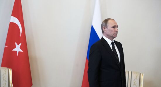 Russian President Vladimir Putin meets with Turkish President Recep Tayyip Erdogan in St. Petersburg