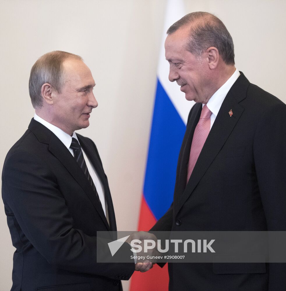 Russian President Vladimir Putin meets with Turkish President Recep Tayyip Erdogan in St. Petersburg