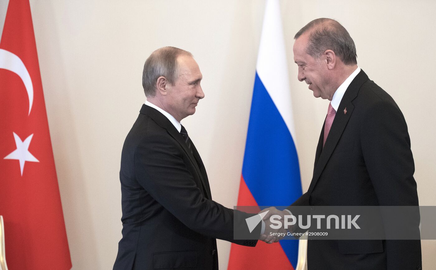 Russian President Vladimir Putin meets with Turkish President Recep Tayyip Erdogan in St. Petersburg