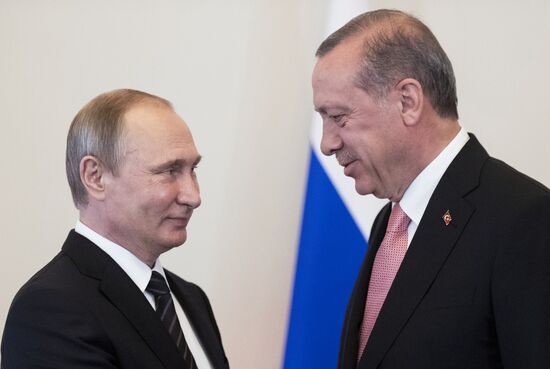 Russian President Vladimir Putin meets with Turkish President Recep Tayyip Erdogan in St. Petersburg