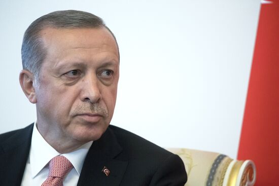 Russian President Vladimir Putin meets with Turkish President Recep Tayyip Erdogan in St. Petersburg