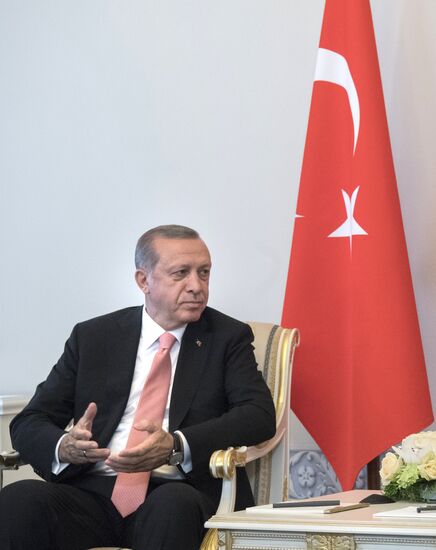 Russian President Vladimir Putin meets with Turkish President Recep Tayyip Erdogan in St. Petersburg