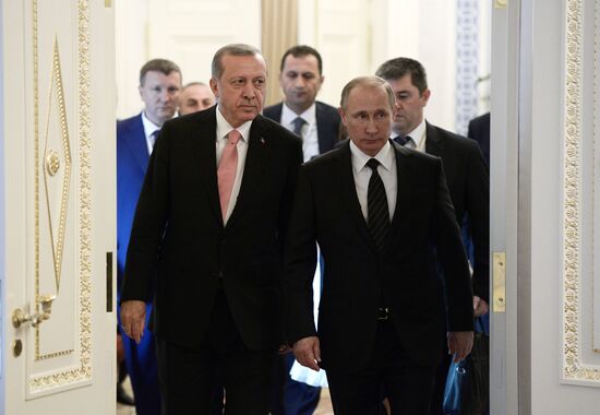 Russian President Vladimir Putin meets with Turkish President Recep Tayyip Erdogan in St. Petersburg