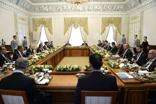 Russian President Vladimir Putin meets with Turkish President Recep Tayyip Erdogan in St. Petersburg