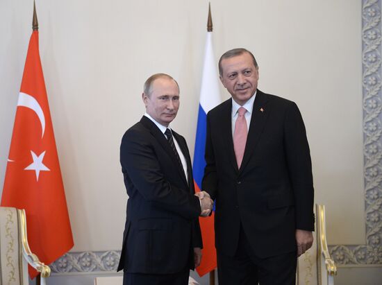 Russian President Vladimir Putin meets with Turkish President Recep Tayyip Erdogan in St. Petersburg