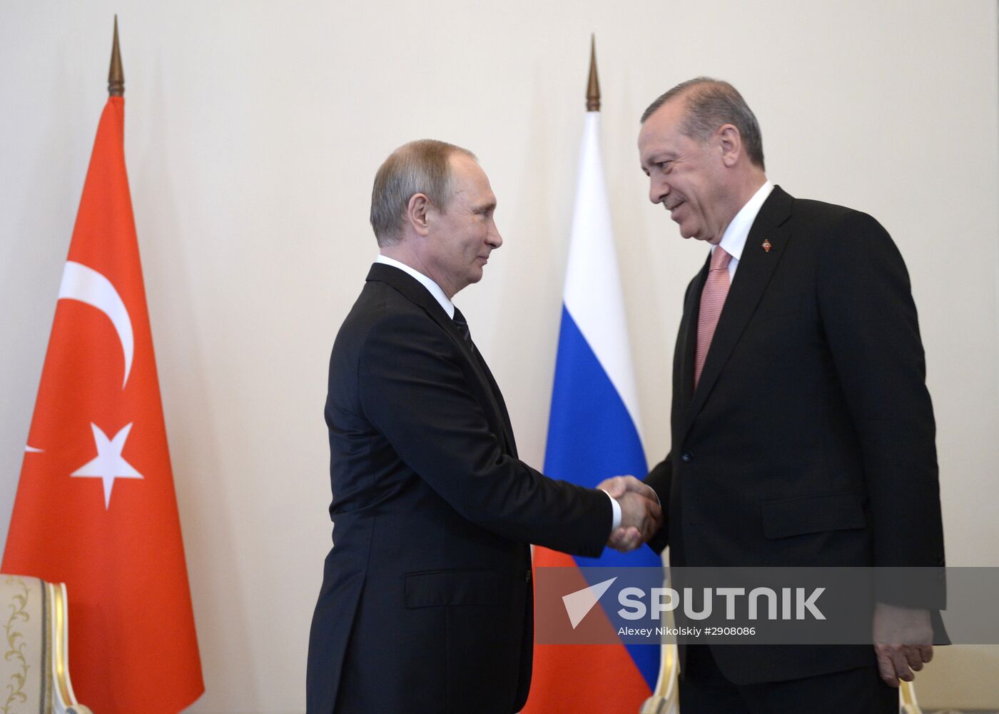 Russian President Vladimir Putin meets with Turkish President Recep Tayyip Erdogan in St. Petersburg