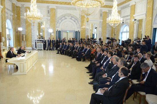 Russian President Vladimir Putin meets with Turkish President Recep Tayyip Erdogan in St. Petersburg