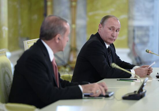 Russian President Vladimir Putin meets with Turkish President Recep Tayyip Erdogan in St. Petersburg