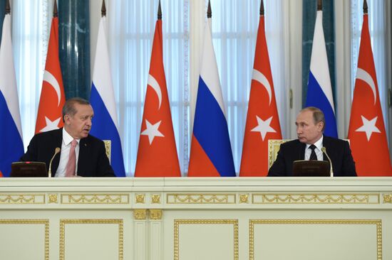 Russian President Vladimir Putin meets with Turkish President Recep Tayyip Erdogan in St. Petersburg