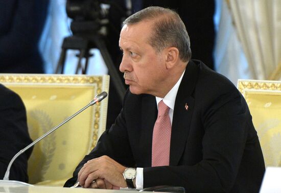 Russian President Vladimir Putin meets with Turkish President Recep Tayyip Erdogan in St. Petersburg