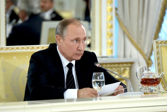 Russian President Vladimir Putin meets with Turkish President Recep Tayyip Erdogan in St. Petersburg