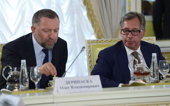 Russian President Vladimir Putin meets with Turkish President Recep Tayyip Erdogan in St. Petersburg