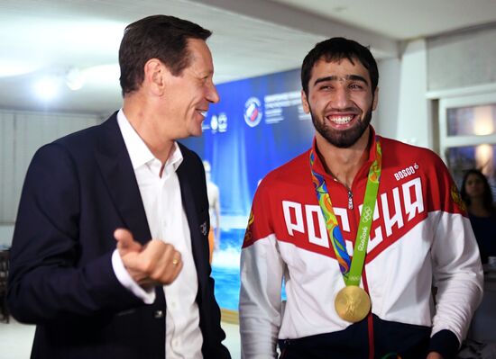 Russian judo wrestler Khasan Khalmurzayev congratulated at Russian House