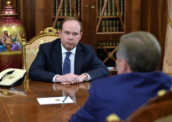 President Vladimir Putin meets with Sergei Ivanov and Anton Vaino