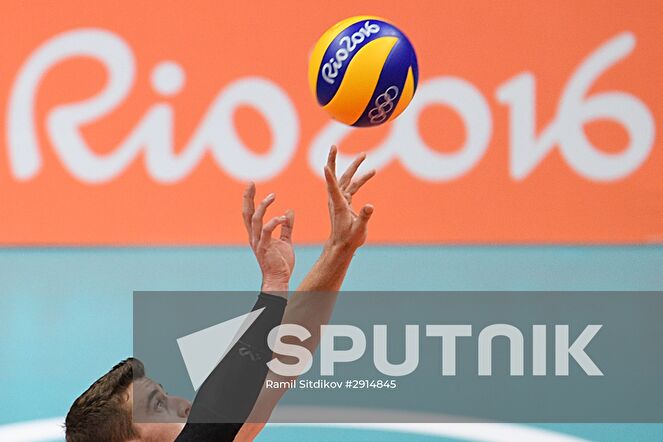 Canada's Tyler Sandars during the quarterfinals of the men's volleyball between Canada and Russia at the XXXI Summer Olympics. Location: Brazil, Rio de Janeiro. Author: Ramil Sitdikov/Sputnik. The 2016 Summer Olympics. Volleyball. Men. Canada vs. Russia