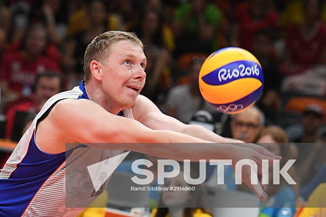 Russia's Sergei Grankin during the quarterfinals of the men's volleyball between Canada and Russia at the XXXI Summer Olympics. Location: Brazil, Rio de Janeiro. Author: Ramil Sitdikov/Sputnik. The 2016 Summer Olympics. Volleyball. Men. Canada vs. Russia