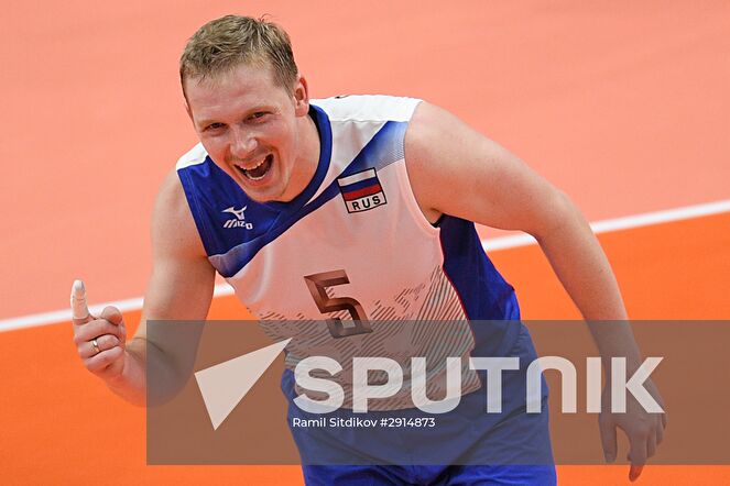 Russia's Sergei Grankin during the quarterfinals of the men's volleyball between Canada and Russia at the XXXI Summer Olympics. Location: Brazil, Rio de Janeiro. Author: Ramil Sitdikov/Sputnik. The 2016 Summer Olympics. Volleyball. Men. Canada vs. Russia
