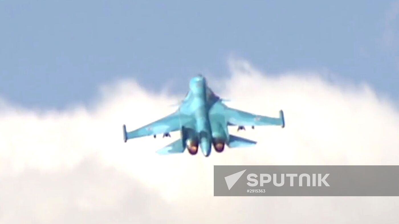 Russia's Sukhoi Su-34 Fullback tactical bombers from Hamadan air base strike ISIS sites in Syria