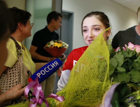 Russian Olympic gymnastics team comes back from Rio