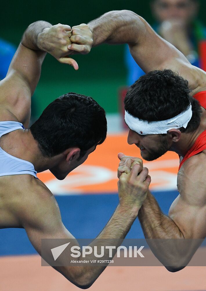 2016 Summer Olympics. Freestyle wrestling. Men. Day One