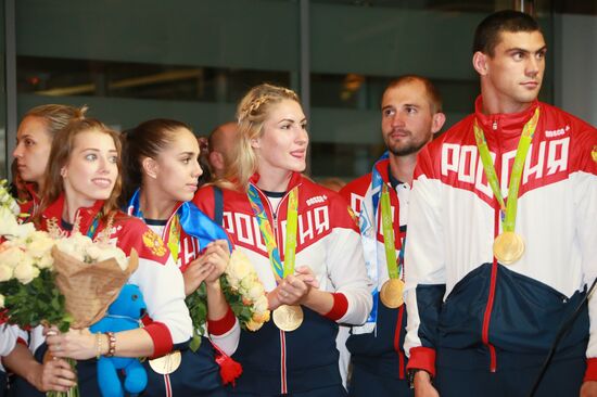 Welcoming Golden Flight with champions and prize winners of XXXI Olympics
