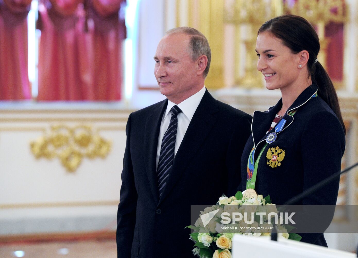 President Vladimir Putin gives government awards to Olympic medalists