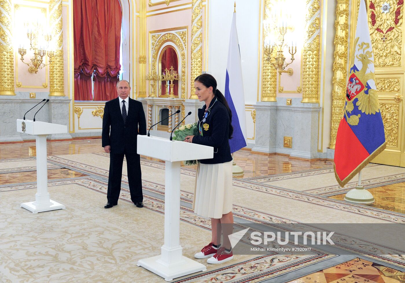 President Vladimir Putin gives government awards to Olympic medalists