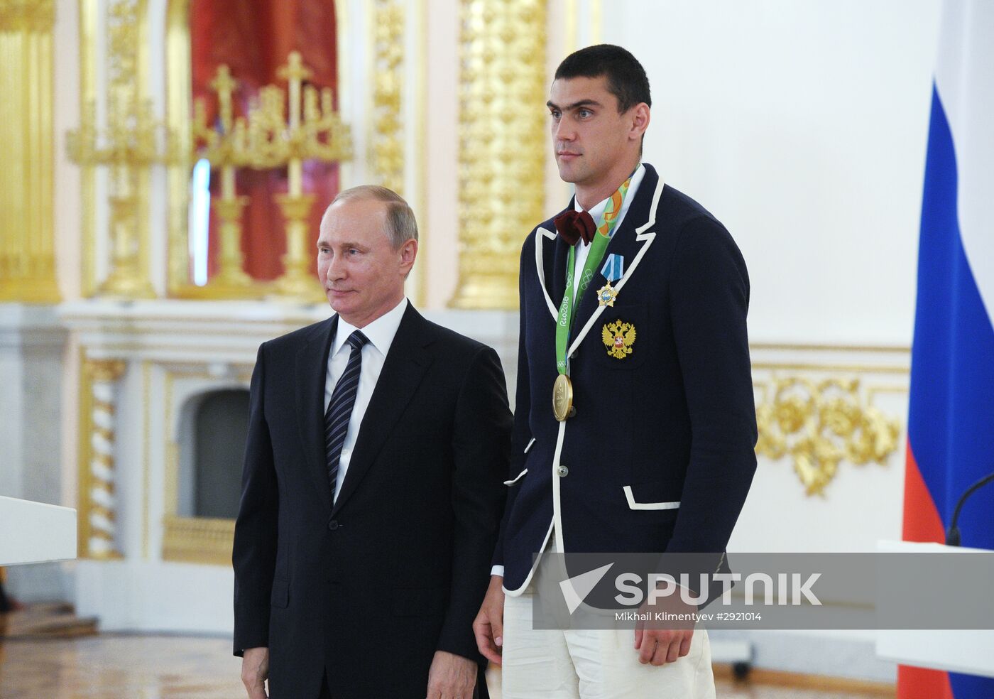 President Vladimir Putin gives government awards to Olympic medalists