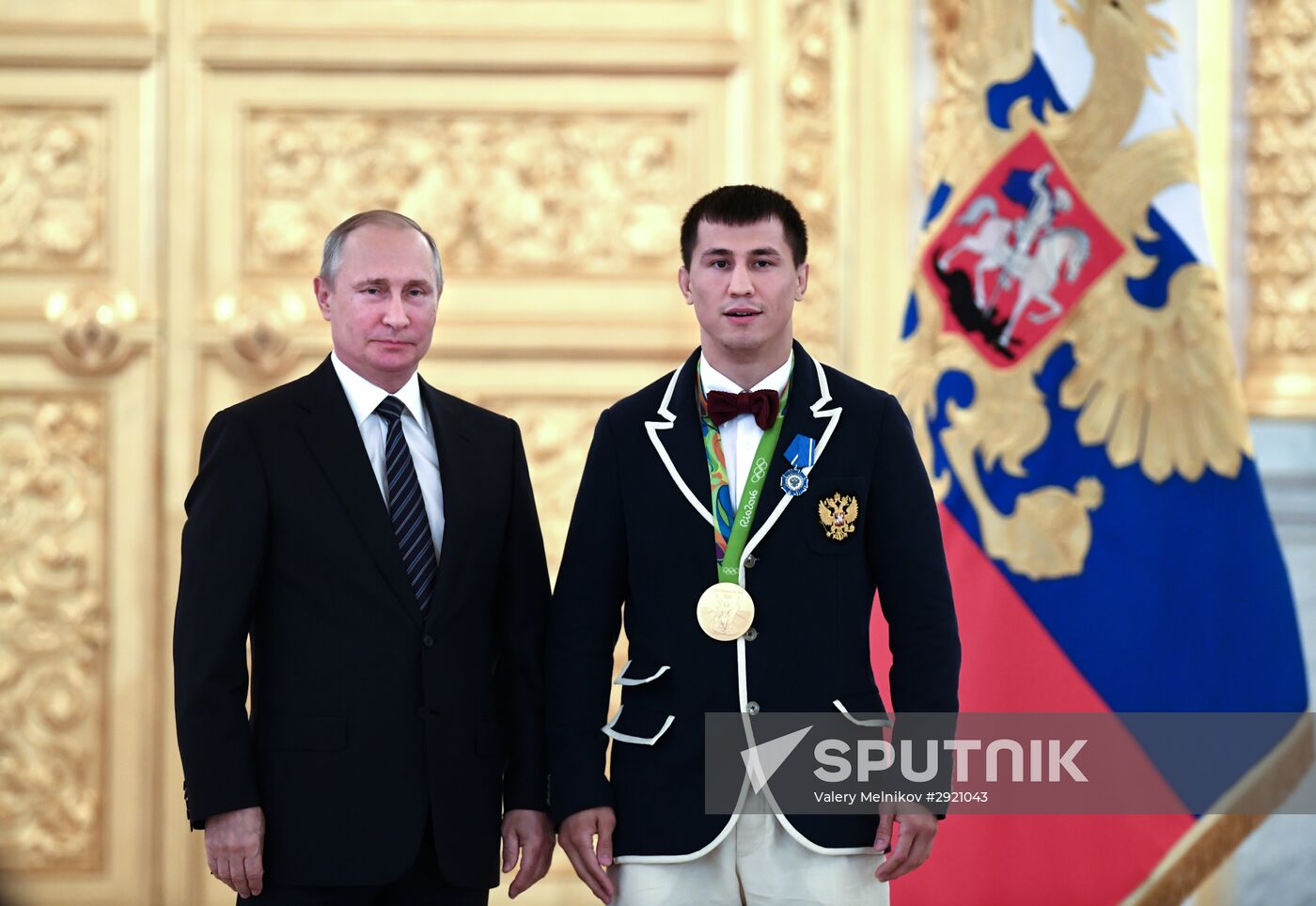 President Vladimir Putin gives government awards to Olympic medalists