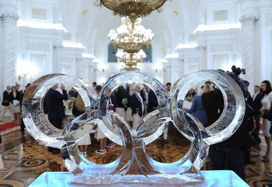 President Vladimir Putin gives government awards to Olympic medalists