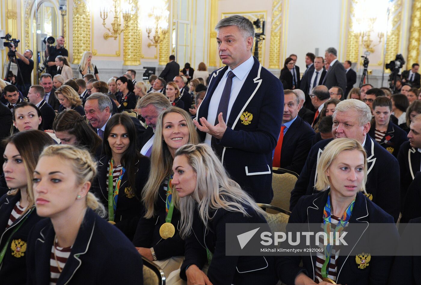 President Vladimir Putin gives government awards to Olympic medalists